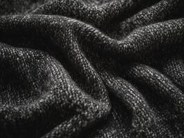Boucle fabric in a warm grey shade drapes softly creating intricate patterns and a cozy texture suitable for various textile projects photo