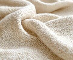 Boucle fabric showcases soft texture and natural color, perfect for cozy interiors and stylish apparel photo