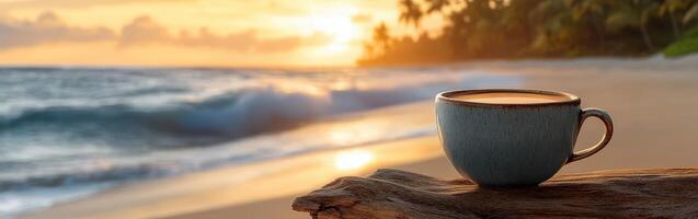 Enjoying a warm cup of coffee at sunset on a tranquil beach with gentle waves lapping at the shore photo