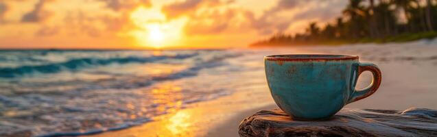 Sunrise on a tropical beach with a steaming cup of coffee resting on a wooden table photo