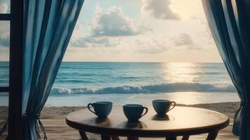 Enjoying morning coffee by the beach as the sun rises over the ocean waves photo