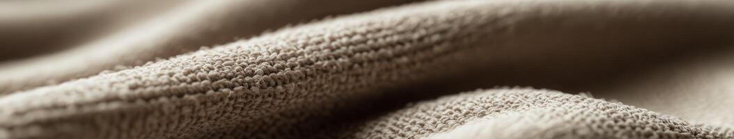 Boucle fabric texture in soft beige tones showcasing intricate woven patterns and tactile quality suitable for various design applications photo