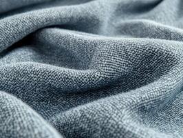 Explore the unique texture of boucle fabric captured in intricate folds and waves, showcasing its soft and inviting nature photo