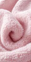 Soft pink boucle fabric texture displaying a cozy, inviting twist for home decor and textile design photo