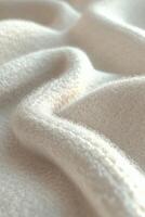 Textured white boucle fabric showcasing soft and cozy qualities perfect for fashion and interior design projects photo
