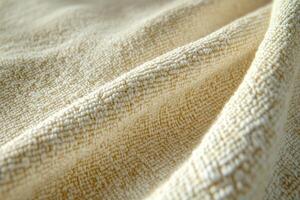 Explore the intricate texture of boucle fabric capturing its soft, looped surface in natural light photo