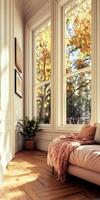 A room with a couch and windows photo
