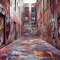 Vibrant graffiti alley in urban area reveals creativity and artistic expression in colorful street art during a sunny day photo