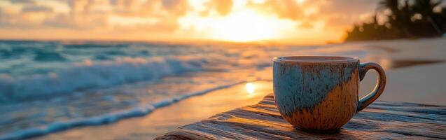 Enjoying coffee by the beach as the sun rises over the ocean waves in a tranquil morning setting photo