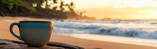 Enjoying morning coffee by the ocean as the sun rises over the horizon in a tropical paradise photo