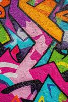 Vibrant graffiti showcasing colorful shapes and patterns on a wall photo