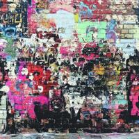 Colorful graffiti covers the urban wall in an artistic display photo