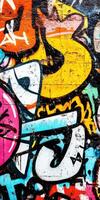 Vibrant urban graffiti showcasing artistic expression in bold colors photo