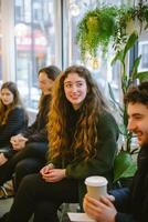 Group therapy session with a psychologist in a cafe photo