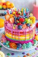 Colorful bento cake decorated with fruits and sweets photo