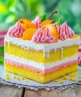 Beautiful bento cake with vibrant frosting and fruit photo