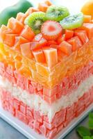 Colorful bento cake made of fresh fruit cubes photo