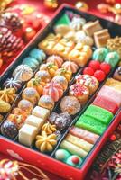 Bento cake assortment with colorful treats for celebrations photo