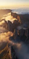 Sunset over mountain cliffs photo