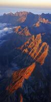 A view of mountains from an airplane photo