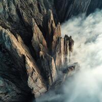 Rock formations in misty landscape photo