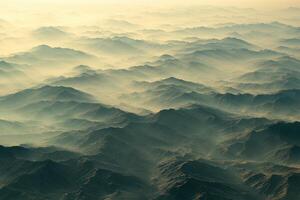 Misty mountain landscape at dawn photo