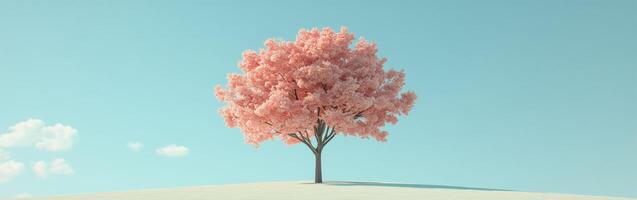 A pink tree stands alone on a hill photo