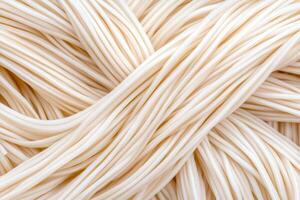 Close-up of Uncooked Noodles creating a Textured Food Background photo