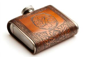 Elegant leather-bound hip flask showing intricate floral design and monogram photo
