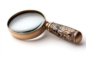 Magnifying glass with decorated handle is showing something on white background photo