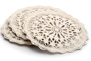 Decorative round lace doilies creating elegant pattern on white background photo