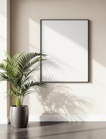 A blank frame in a room with a plant photo