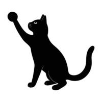 Playful cat batting at a small object in lively silhouette vector