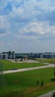 Modern factory among fields. video