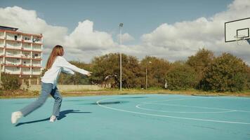 Smiling Woman Dancing in Open Court Space video