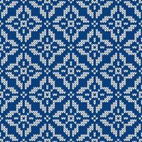 Scandinavian knitted seamless pattern. Norwegian native style sweater with snowflakes. Wool texture. Winter holiday background, blue vector