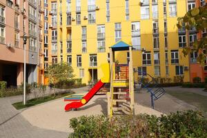 Inside courtyard playground in a modern residential complex photo