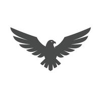 A black bird flying on a white background vector