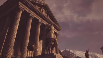 View of ancient temple with statues under cloudy sky at sunset video