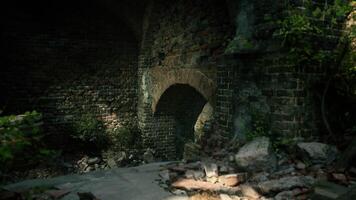 Exploring an ancient stone archway in a forgotten ruins surrounded by greenery video