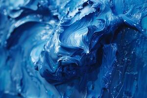 A close up of a blue paint on a wall photo