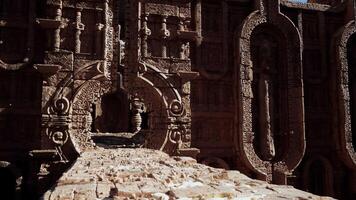 A large stone building with carvings on the side of it video