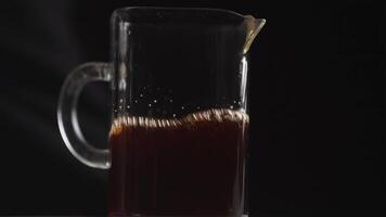 Brewing Coffee in a Glass Pitcher for an Invigorating Morning Beverage Experience. Media video