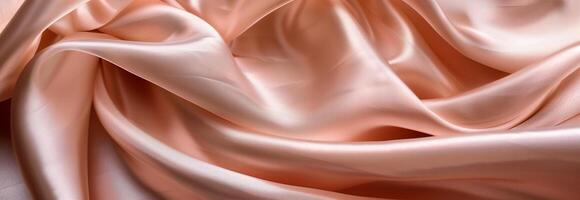 A close up of a pink satin fabric photo