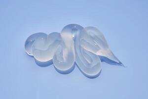 Gel toothpaste on a blue background. photo
