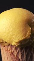 360 degrees rotation of a delicious mango ice cream cone Sweet and dessert concept video