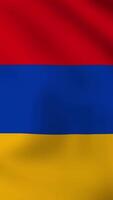 Vertical, portrait, waving national flag of Armenia. Smooth animation with highly detailed, realistic animated background for social media, screens smartphone. Official colors cloth motion video