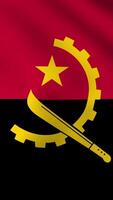 Vertical, portrait, waving national flag of Angola. Smooth animation with highly detailed, realistic animated background for social media, screens smartphone. Official colors cloth motion video
