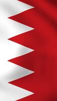 Vertical, portrait, waving national flag of Bahrain. Smooth animation with highly detailed, realistic animated background for social media, screens smartphone. Official colors cloth motion video