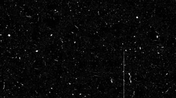 Free Random dust and scratches for use as videos 4k overlay to add texture, film damage or grunge style. Perfect for creating an old, vintage projector style or nostalgic memory sequence. Loop-ready